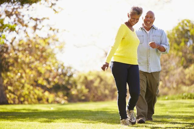 Couple walking in park